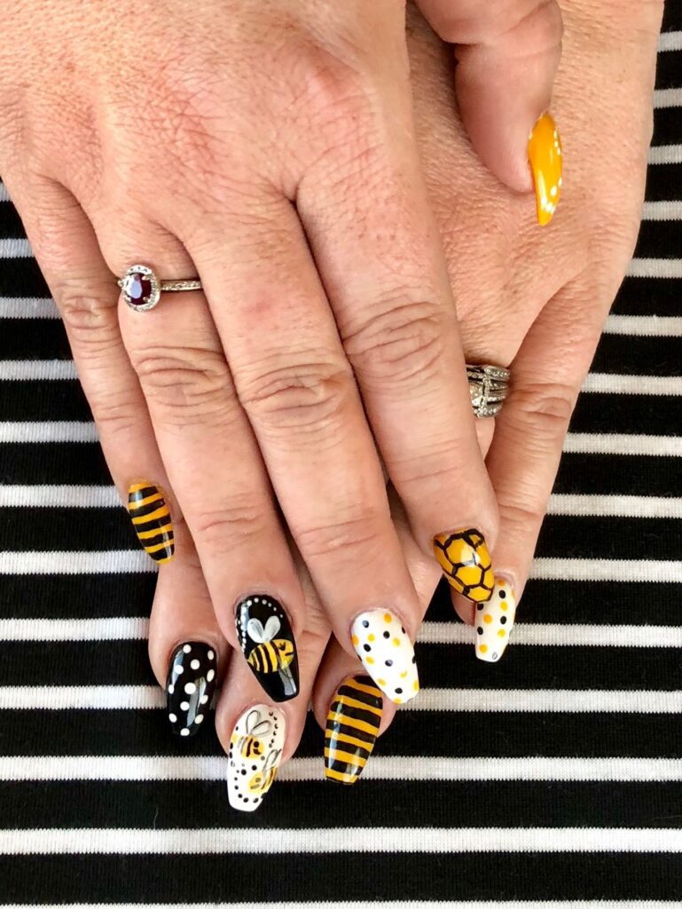 black and yellow bee nails